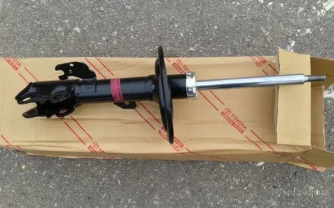 Амортизатор передний левый V40